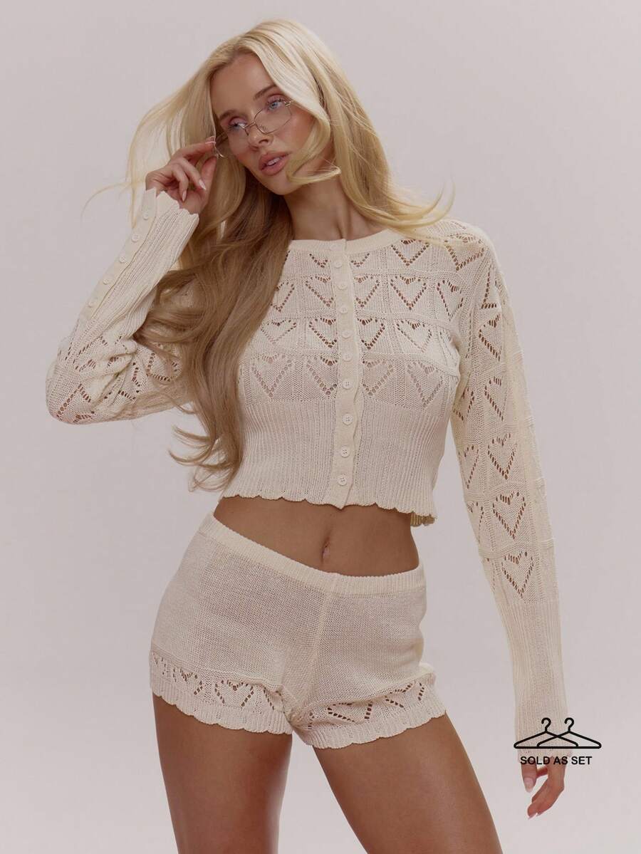 MUSERA Áo khoác cardigan dệt kim ôm dáng, cạp chun bo gân, cài cúc phía trước, viền ren lượn sóng, kết hợp với quần short dệt kim ngắn, bán theo bộ. Phong cách dễ thương, nữ tính, gợi cảm, thích hợp cho mùa xuân đông, đi chơi hàng ngày. Sugar Swizzle - Kem - Xem 1