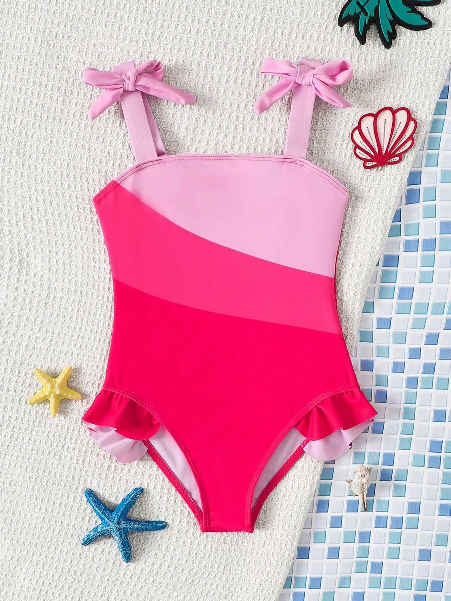 SHEIN Emery Rose Kids Bộ đồ bơi liền thân dễ thương cho bé gái, cổ áo bất đối xứng với nơ và viền bèo phối màu tương phản, màu tím, thích hợp cho du lịch biển mùa xuân/hè và kỳ nghỉ. - Nhiều màu - Xem 1