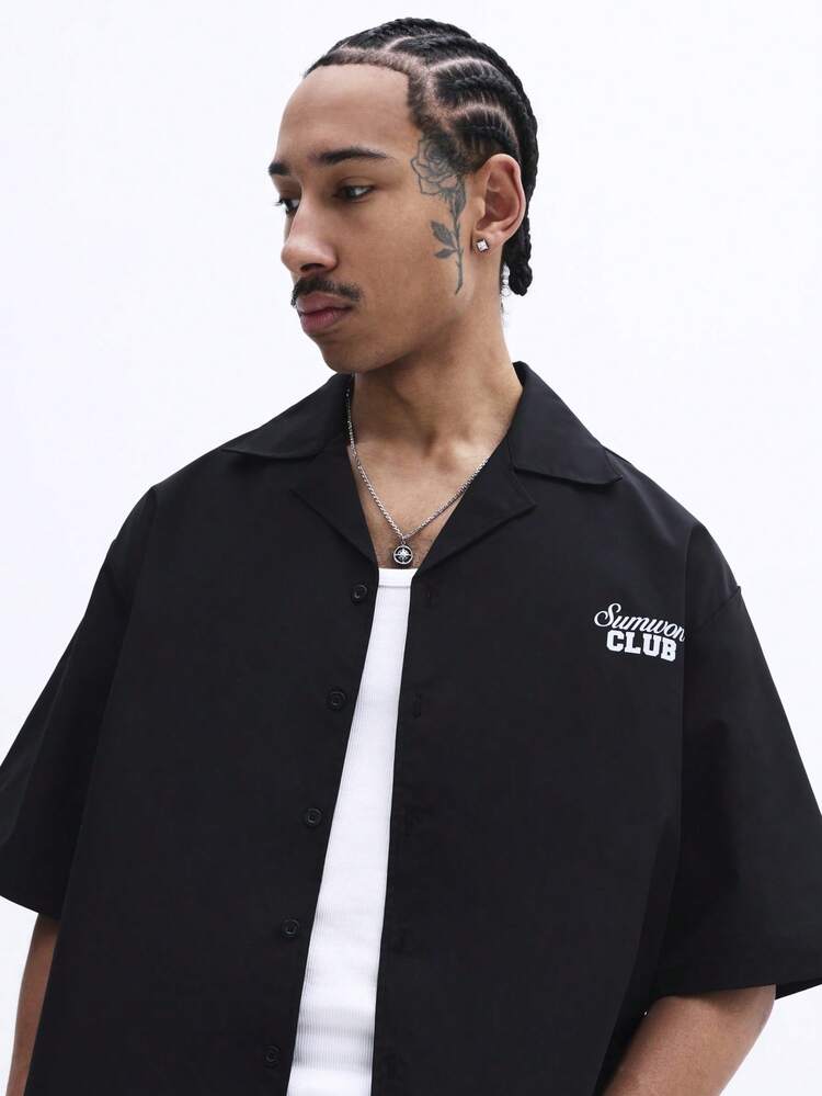 Camisa oversized com botões e estampa de logo