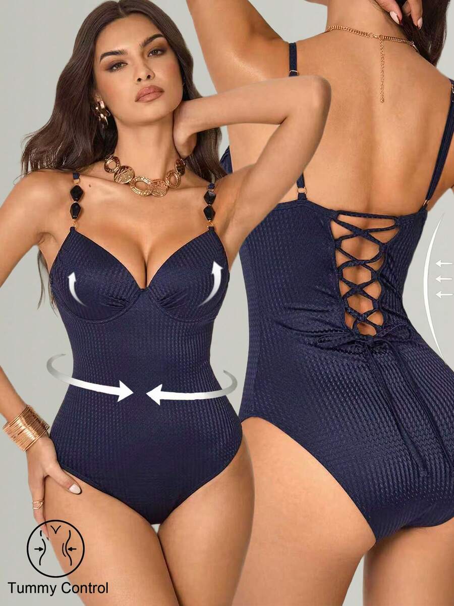 Shapewave Áo tắm liền thân nữ màu xanh hải quân đính ngọc trai, chất liệu jacquard, có gọng nâng ngực, dây đeo có thể điều chỉnh, đính đá kim cương phản quang, lưng khoét sâu, buộc dây, giúp thon gọn vòng bụng, thích hợp cho bãi biển và kỳ nghỉ. - Màu xanh hải quân - Xem 1