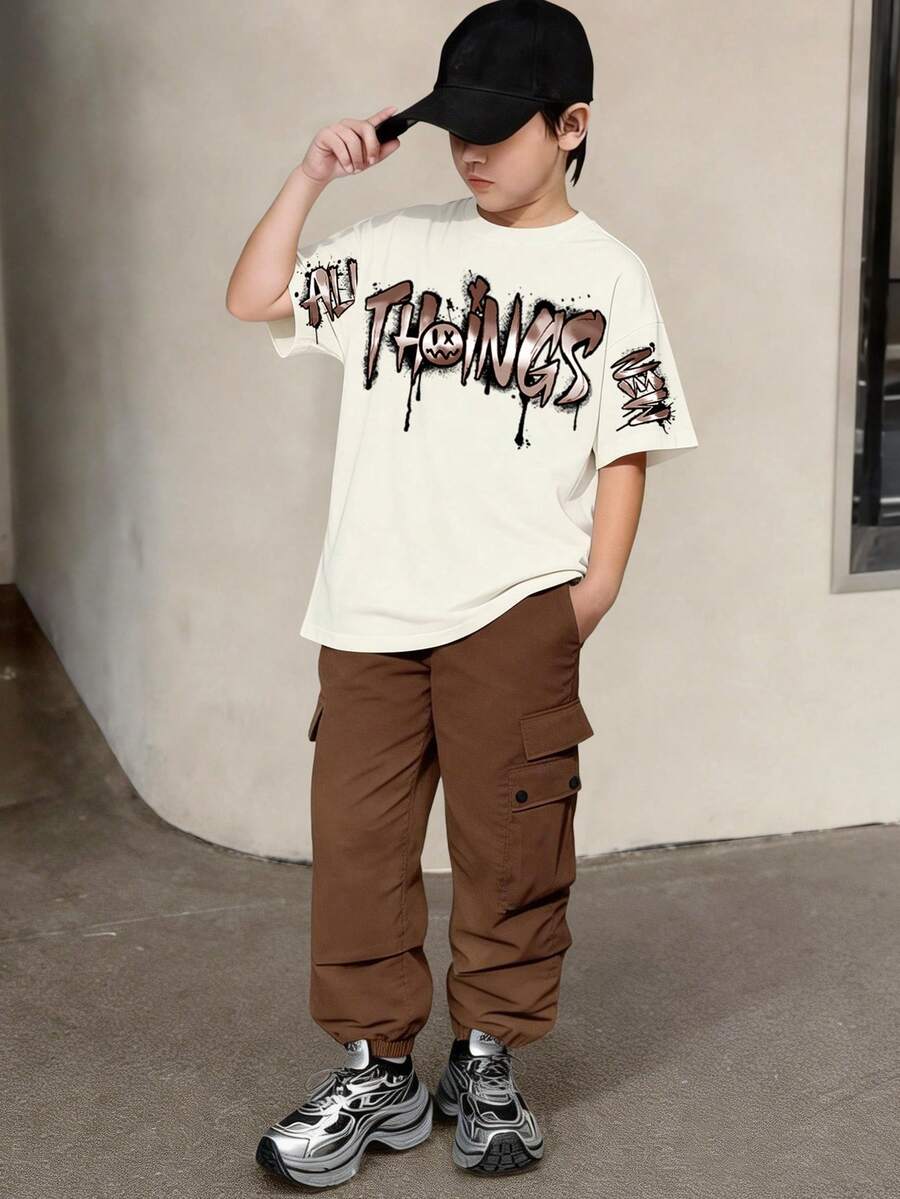 SHEIN 男童舒适休闲宽松T恤套装(2件套),包含T恤和直筒裤,适合日常、运动和户外活动穿着。 - 杏色 - 查看 1