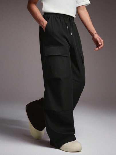 STYNVO Pantalon casual ample à taille élastique et poches, couleur unie, polyvalent pour le port quotidien