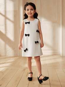 SHEIN Cute Young Girls White Sleeveless Polyester Dress With Black Bows Round Neck Short Length - Black and White - View 1