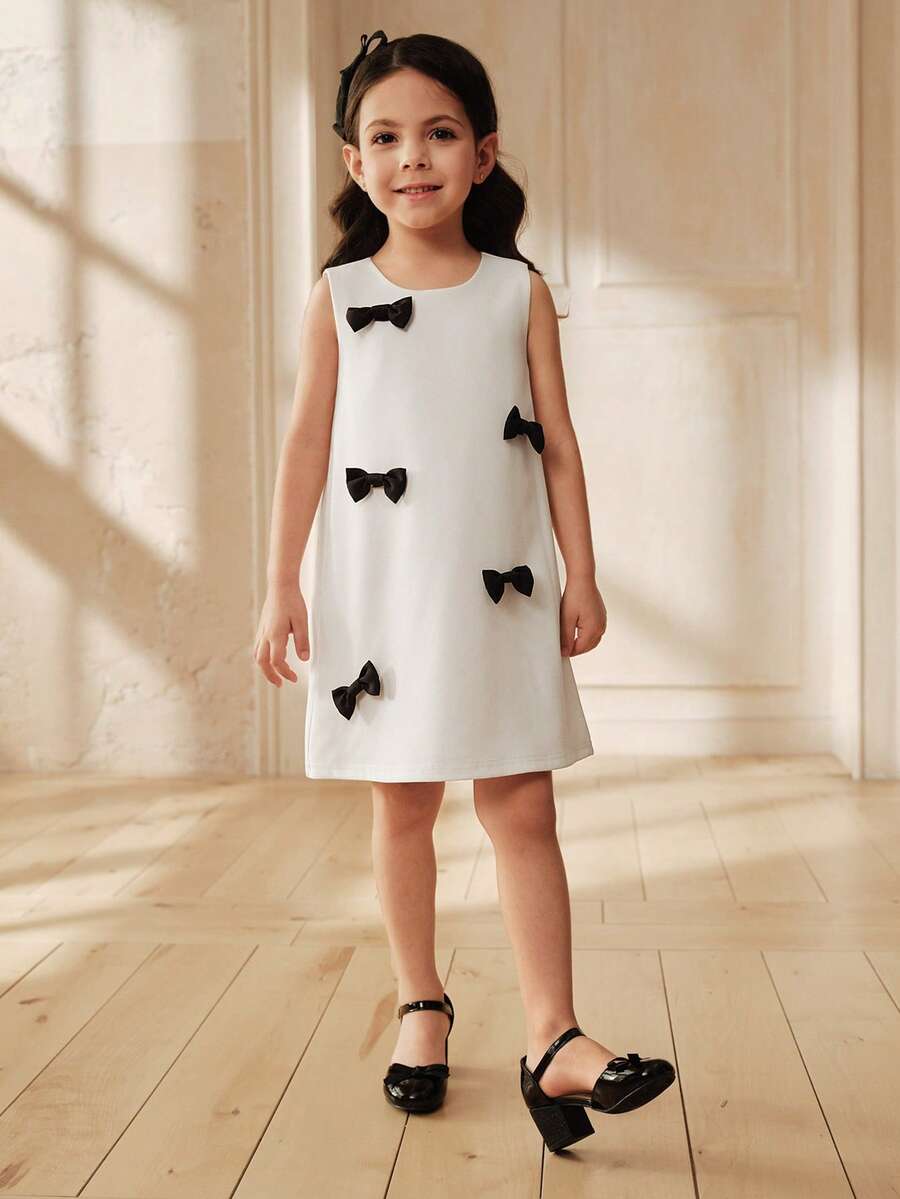 SHEIN Cute Young Girls White Sleeveless Polyester Dress With Black Bows Round Neck Short Length - Black and White - View 1