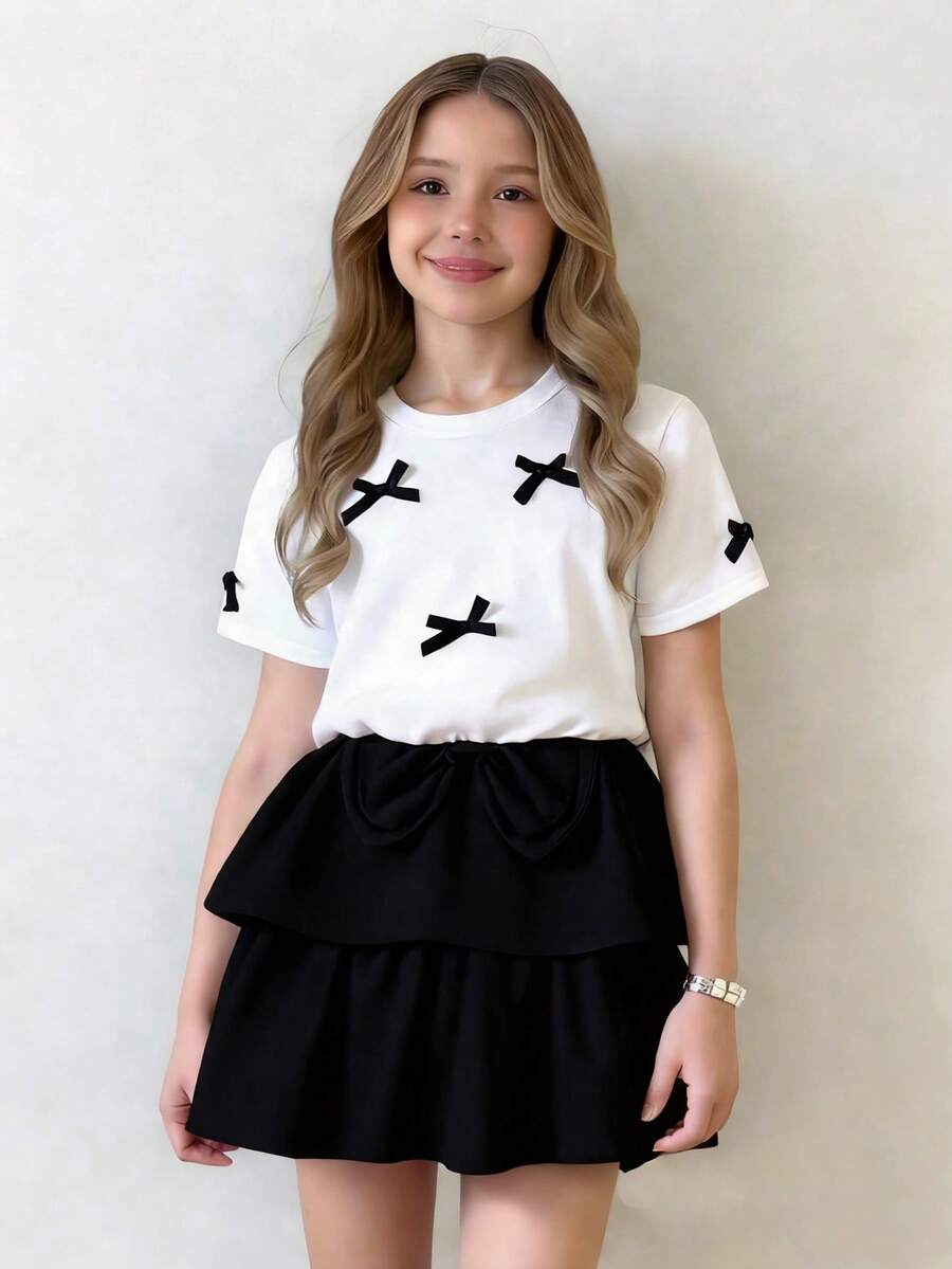 Elladie kids 女童可爱优雅校服连衣裙;黑白舒适短袖蛋糕裙,饰有3D蝴蝶结。白色蝴蝶结上衣搭配双层裙摆,适合日常或度假穿着。 - 黑色 - 查看 1