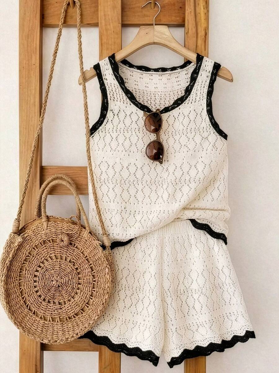 SHEIN Franclia Bộ đồ hai mảnh cao cấp, thiết kế mới, tối giản, mang đến cảm giác nghỉ dưỡng mùa hè. Áo hai dây màu đen cổ lượn sóng khoét rỗng, gợi cảm, ôm sát cơ thể, tôn dáng, kết hợp áo len dệt kim không tay phối màu tương phản dành cho nữ. - Đen và trắng - Xem 1