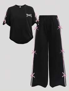 SHEIN Girlism 少女两件套休闲套装，黑色针织蝴蝶结装饰宽松圆领印花褶皱简约套头衫和短裤套装，适合日常休闲穿着、返校、度假、家庭户外春季野餐。 - 黑色 - 查看 7