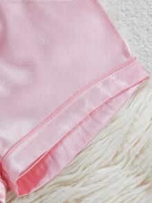 Bộ 2 món cho bé gái, gồm áo khoác cardigan màu hồng nhẹ nhàng, thoải mái có túi, áo sơ mi thắt nơ và quần short, thích hợp mặc ở nhà. - Nhiều màu - Xem 3