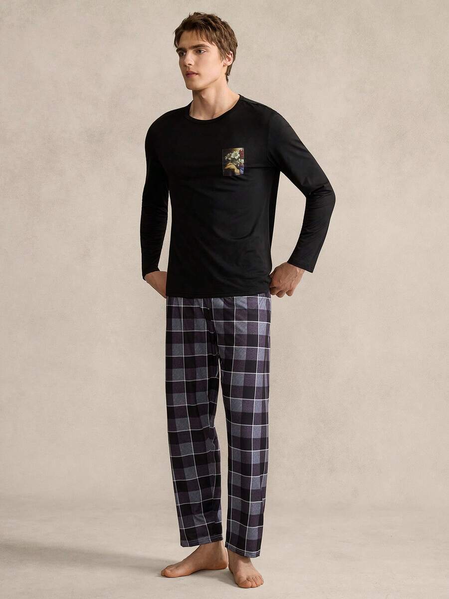 Manfinity Underwear&Sleepwear Basics 男士睡衣套装,包含一件纯黑色长袖圆领上衣,左胸饰有装饰性图案贴片,搭配经典的黑灰格纹长裤。整体风格简约百搭,细节设计巧妙,打造出休闲又不失层次感的造型。 - 黑色 - 查看 1