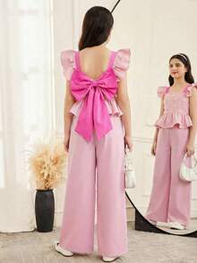 SHEIN Bộ đồ đôi cho bé gái tuổi teen, gồm áo không tay dệt kim khoét eo, lưng nơ và quần ống rộng xếp ly, thích hợp cho tiệc sinh nhật, lễ tốt nghiệp và khiêu vũ. - Hồng - Xem 2