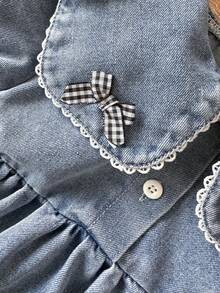 SHEIN Vintaside Kids 女婴牛仔休闲宽松短袖连衣裙，采用水洗做旧工艺，宽领设计，饰有可爱蝴蝶结，轻盈柔软的棉质牛仔面料，时尚百搭，是女孩们的必备单品，适合春夏穿着，休闲、拍照、外出、派对等场合皆宜，夏季新品上市。 - 淺色水洗藍 - 查看 9