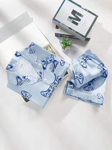 Bộ 2 món đồ mặc thường ngày thoải mái cho bé trai tuổi thiếu niên, gồm áo polo ngắn tay in hình tay cầm chơi game tối giản và quần short cùng màu. - Nhiều màu - Xem 8