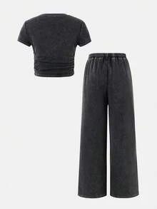 SHEIN Conjunto informal de 2 piezas para niña preadolescente con camiseta de cuello redondo plisada con lazo decorativo y pantalones de corte holgado de unicolor - Rosa - Ver 2