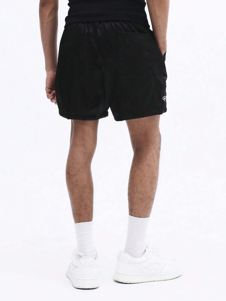 Pantaloncini a righe con grafica circolare