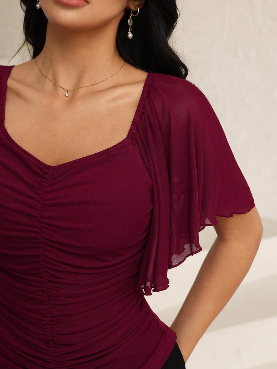 Modelyn Áo thun màu đỏ rượu vang, thiết kế lưới xếp nếp, thời trang, thanh lịch và gợi cảm, thích hợp cho các buổi hẹn hò và đi chơi. - Màu Đỏ Sâu - Xem 1