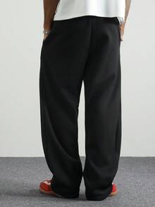 PAVTROS Men's Solid Color Drawstring Pocket Casual Sweatpants, Baggy Black Loose Fit Pants - Black - View 2