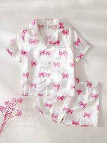Bộ quần áo mặc nhà cho bé gái, gồm áo ngắn tay, cổ bẻ, in nơ màu hồng và quần short, chất liệu chống cháy. - Màu Hồng baby - Xem 1