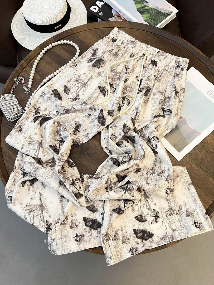 GlowEve 女士时尚休闲水墨蝴蝶印花弹力腰抽绳直筒裤，适合日常穿着 - 彩色 - 查看 1