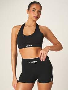 Missguided x Playboy Quần short đạp xe cạp cao với chi tiết sọc trắng bên hông và logo thương hiệu, thích hợp cho hoạt động thể thao. - Đen và trắng - Xem 5