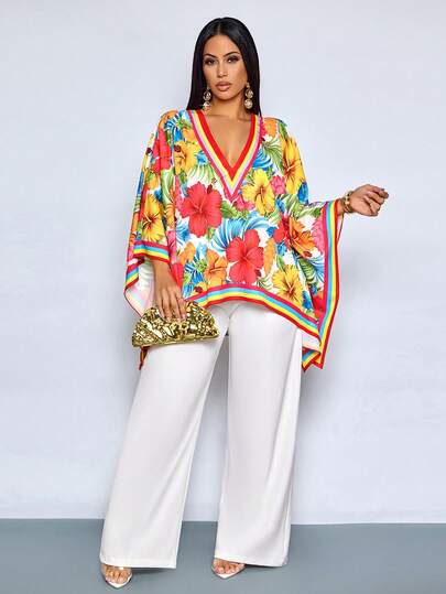 SOLERSUN Blusa holgada de estilo tropical con cuello en V, mangas de murciélago y estampado tropical, ideal para vacaciones de playa y resort