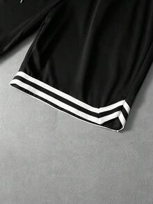 PAVTROS 男士街头学院风运动休闲装，INS风黑色休闲短裤，高街黑白撞色设计。宽松短裤采用抽绳设计，适合音乐节和日常穿着。 - 黑色 - 查看 5