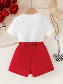 SHEIN Elladie kids 两件套女童休闲新款T恤套装，女童两件套，白色荷叶边领罗纹上衣配红色花朵胸针+红色珍珠装饰短裙套装，幼儿儿童优雅短袖上衣和高腰开衩短裙，适合派对、生日、休闲场合。女童衬衫，女童裙装，女童春季服装，女童套装，3-4岁女童每日穿搭，夏季服装……柔软连衣裙，魅力连衣裙，时尚正式连衣裙，基础款，度假风，派对装扮 - 彩色 - 查看 3
