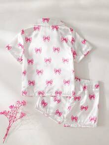 Bộ quần áo mặc nhà cho bé gái, gồm áo ngắn tay, cổ bẻ, in nơ màu hồng và quần short, chất liệu chống cháy. - Màu Hồng baby - Xem 2