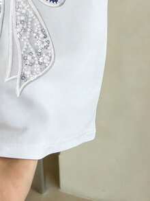 Camiseta de manga corta con cuello redondo y decoración de lazo para adolescentes, adecuada para uso diario, salidas y escuela - Blanco - Ver 4