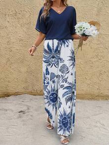 SHEIN Clasi Bộ đồ 2 mảnh phong cách Bohemian thanh lịch dành cho nữ, gồm áo cổ chữ V in họa tiết xanh trắng và quần ống đứng cạp chun, thích hợp cho kỳ nghỉ hè, trang phục thường ngày cho nữ, bộ đồ hè kín đáo cho nữ, trang phục lễ hội 2 mảnh. - Nhiều màu - Xem 5
