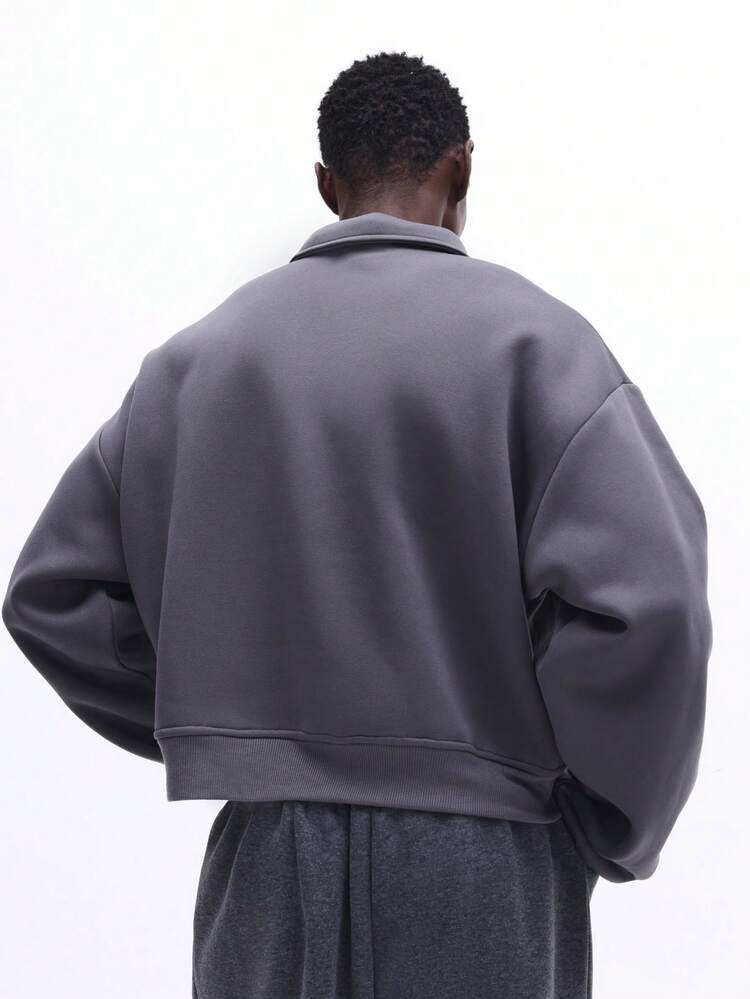 Sweat-shirt à col zippé demi-zip