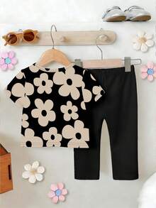 Bộ đồ cho bé gái gồm áo thun ngắn tay cổ tròn in họa tiết hoa tối giản dễ thương và quần legging đen, thích hợp cho các hoạt động mùa xuân/hè. - Nhiều màu - Xem 2