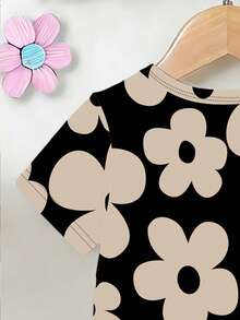 Bộ đồ cho bé gái gồm áo thun ngắn tay cổ tròn in họa tiết hoa tối giản dễ thương và quần legging đen, thích hợp cho các hoạt động mùa xuân/hè. - Nhiều màu - Xem 5