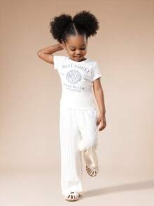 SUMWON 女童夏季海滩主题短袖圆领T恤，饰有贝壳印花和棕榈泉字样，休闲上衣 - 白色 - 查看 3