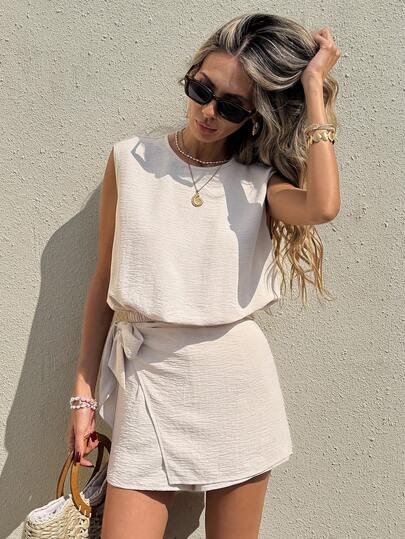 SHEIN Frenchy Conjunto de 2 piezas de top sin mangas y falda envolvente con nudo de unicolor simple para mujer, ideal para verano, vacaciones y uso diario