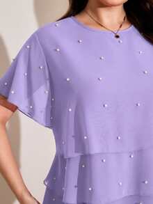 Comfylo 飘逸荷叶边下摆加大码女式短袖衬衫，优雅百搭，适合工作通勤、夏季、圣帕特里克节、复活节、春季、海滩、休闲场合等。女士休闲上衣和衬衫，高端女式上衣，最新款女式上衣，夏季女式上衣热销，休闲女式上衣，优雅新款衬衫，新款衬衫热销。 - 紫羅蘭色 - 查看 4