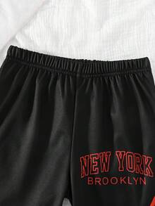 SHEIN Explorewe Bộ 2 món thể thao và thường ngày cho bé trai, gồm áo thun cổ tròn tay ngắn in số và quần short thể thao in hình, có trang trí ruy băng, thích hợp cho mặc hàng ngày vào mùa xuân/hè, thể thao, dã ngoại, đi học, dự tiệc, nghỉ mát. - màu đen - Xem 8