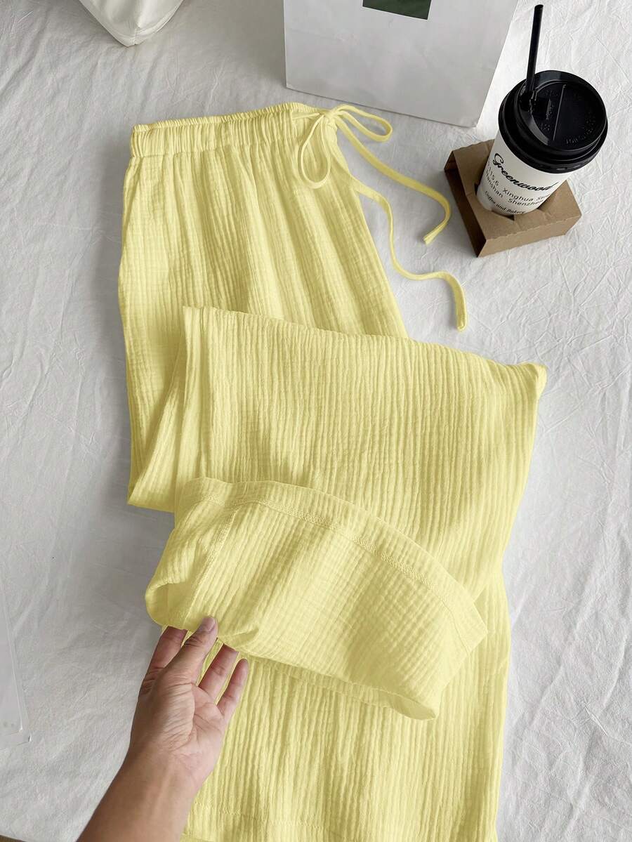 SHEIN EZwear Quần ống rộng dáng suông, màu trơn, chất liệu vải nhăn, có dây rút, thích hợp cho kỳ nghỉ hè, cỡ lớn. - Màu vàng ngỗng - Xem 1