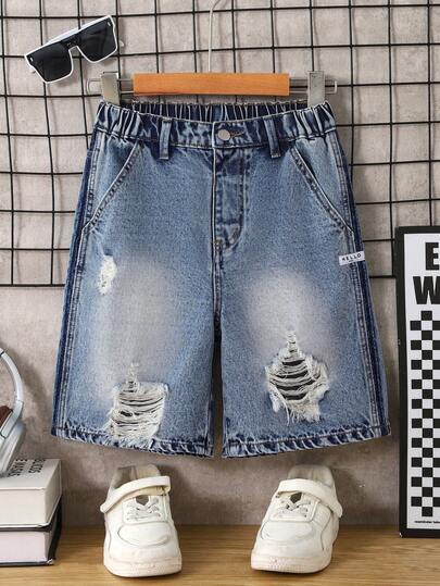 男童破洞牛仔短裤，夏季畅销款，中蓝色牛仔布，Y2K学院风街头潮流，大胆的破洞设计，宽松版型，舒适棉质面料，适合日常穿着、上学、聚会，2026返校季新品