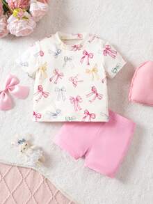 Conjunto de camiseta de manga corta con patrón de lazo y pantalones cortos de cintura elástica, estilo casual de verano para bebé niña recién nacida - Rosa - Ver 3