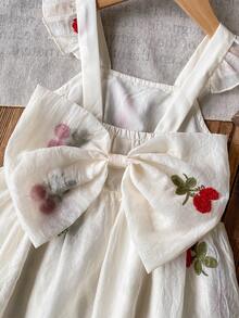 Ruffle Strap Cherry Puff A-Line Dress. Featuring Ruffle Trim Shoulder Straps, A 3D Bow At The Back, And A Puff A-Line Silhouette That Ensures Freedom Of Movement While Maintaining An Elegant Look. Suitable For Outings, Friend Gatherings, And Family Celebrations, Making Your Little One The Center Of Attention. - Apricot - View 8