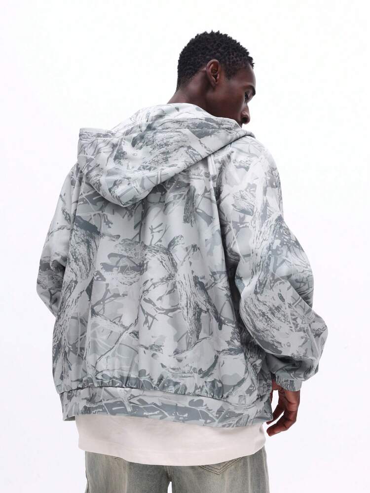 Sweat à capuche camouflage zippé coupe carrée