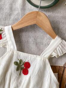 Ruffle Strap Cherry Puff A-Line Dress. Featuring Ruffle Trim Shoulder Straps, A 3D Bow At The Back, And A Puff A-Line Silhouette That Ensures Freedom Of Movement While Maintaining An Elegant Look. Suitable For Outings, Friend Gatherings, And Family Celebrations, Making Your Little One The Center Of Attention. - Apricot - View 7