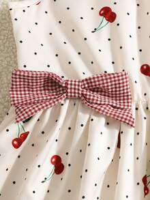 Đầm bé gái in hình quả anh đào, cổ polo, họa tiết kẻ caro tương phản, dáng chữ A thắt eo, điểm nhấn nơ, thích hợp cho kỳ nghỉ thường ngày. - Nhiều màu - Xem 7