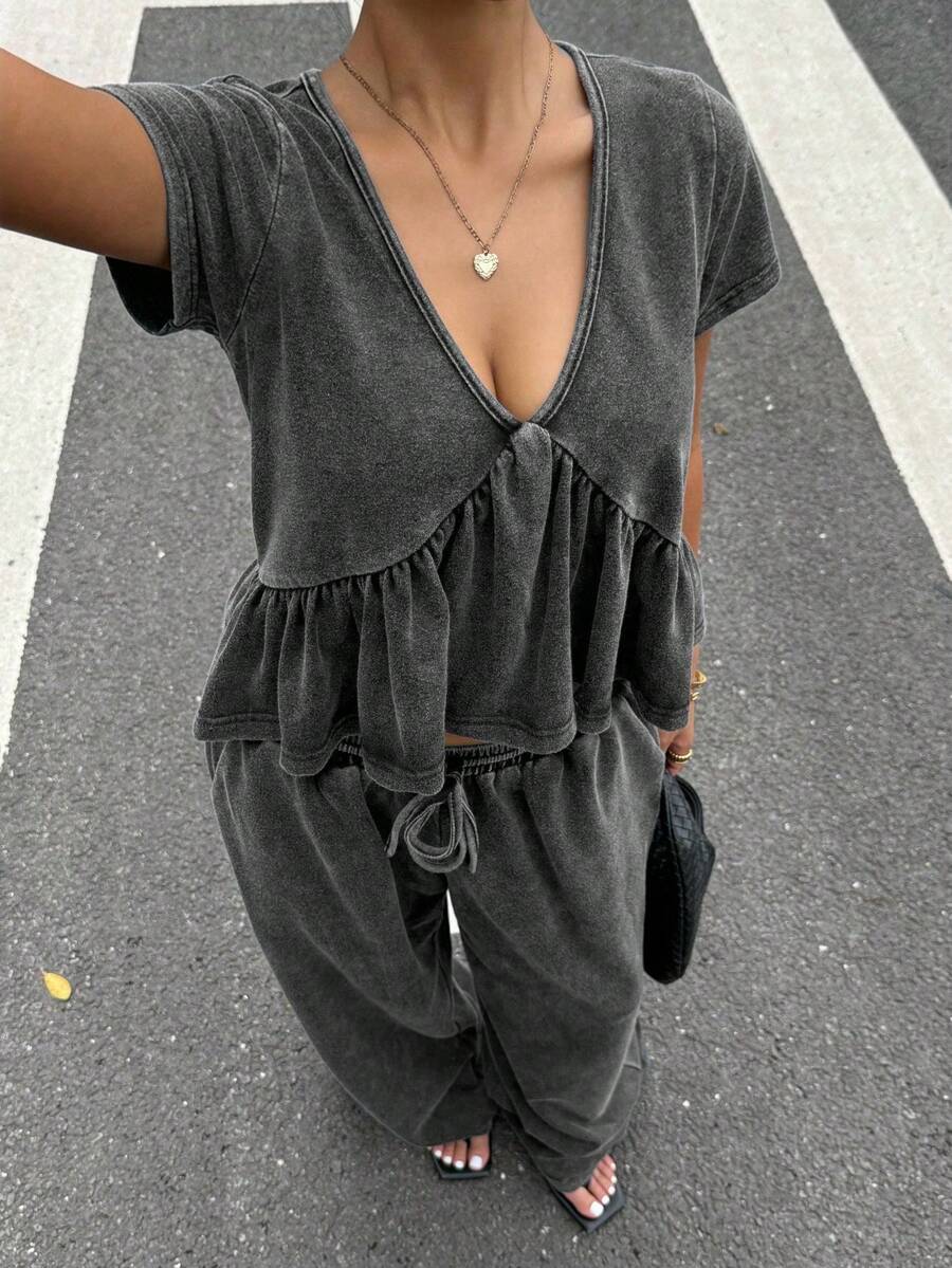 Muchica Plus Size Women's Solid Color V-Neck Short Sleeve Ruffle Hem Top And Wide Leg Pants Casual 2 Piece Set, Spring/Summer,Carnival Women Look 2026,Going Out Outfits,Beach Outfit, Holiday Outfits,Black, Summer Outfits - Black - View 1