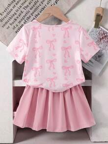Ensemble T-shirt court en tricot à col rond avec imprimé nœud mignon de style Y2K pour filles + Jupe mini plissée de couleur unie - Rose bonbon - Voir 2