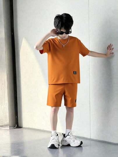 SHEIN Set de 2 piezas de camiseta de manga corta y pantalones cortos de unicolor casual de verano para niño preadolescente