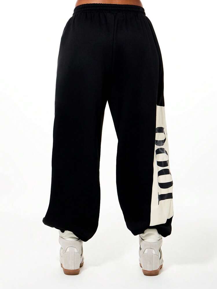 SUMWON WOMEN Oversized Plain Cuffed Graphic Sweatpants With Large Scale Print And Drawstring Waist For Casual Comfort And Street Style
