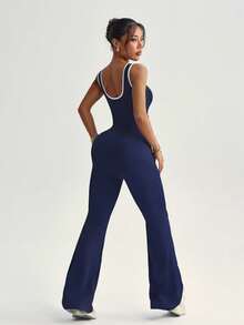 Dewbera 女士黑色连体裤，喇叭裤款式，适合春夏穿着，正面撞色拼接褶皱镂空设计，高腰U领U型后背，适合休闲、健身、瑜伽、跑步等场合。 - 藏蓝色 - 查看 4