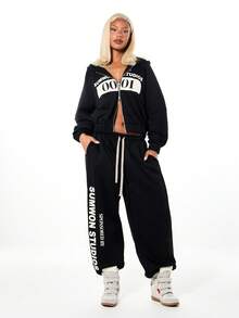 SUMWON WOMEN Oversized Plain Cuffed Graphic Sweatpants With Large Scale Print And Drawstring Waist For Casual Comfort And Street Style - Black - View 3
