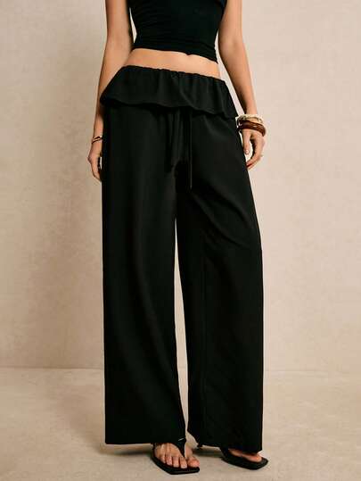 Poéselle Women's Ruffle-Waist Wide-Leg Pants – High-Rise Drawstring Palazzo Trousers For Effortless Chic & Resort Lounge Style Ruffle Waist Pants Black Palazzo Trousers Wide Leg Lounge Pants Resort Wear Outfits Quiet Luxury Style Minimal Chic Bottoms Solid Color Casual Versatile Wide Leg Suit Pants For Daily Wear Summer Outfits Going Out Outfits